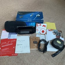 PSP 1003 Black Console Boxed Giga Pack, Manuals, 1GB stick, case+ 2 games