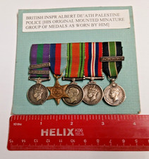 Long Service Palestine Police Miniatures Group to Insp A De'ath