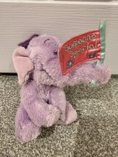 Disney Heffalump Holding a