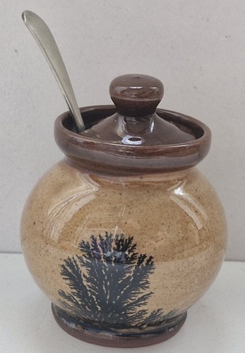Old pottery jar with possible - pottery,