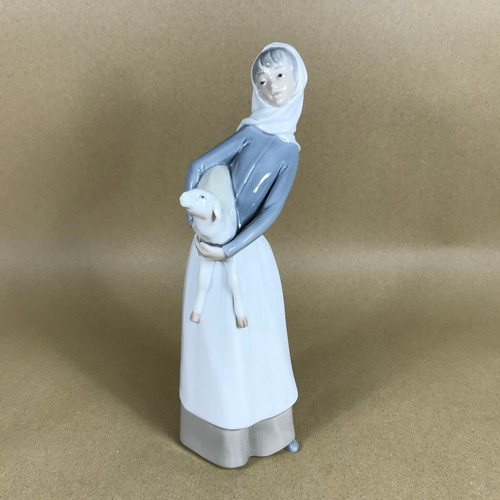 Lladro girl with lamb figurine - with,