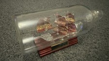 hand-blown hms glass ship in a