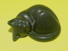 A Small Suzie Marsh Curled Up