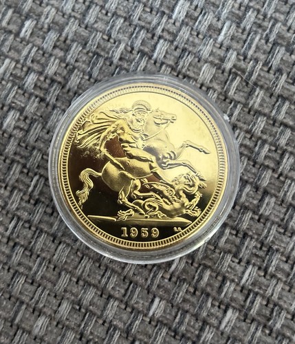 1959 gold coloured coin - coin, in