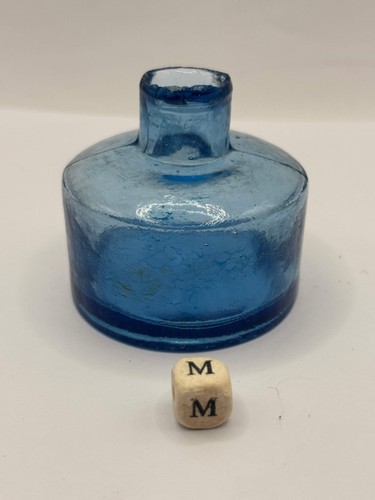 Old blue glass ink bottle
