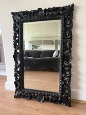 Large ornate mirror in a black shell design, excellent condition