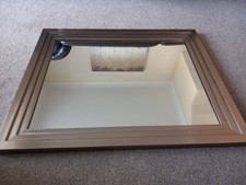 rectangular wall mirror with a