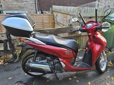 Honda SH300i Scooter, Heated grips, hand guards, windscreen, Top Box & Tracker