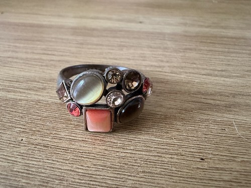 Multi coloured gem with - coloured,