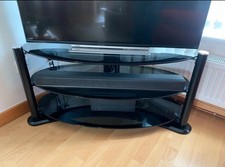 TV Stand Black Solid Glass Oval 3 Shelfs In Excellent Condition.