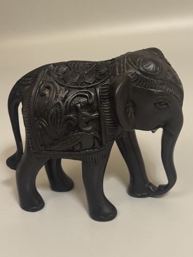 Carved black elephant figurine - carved,