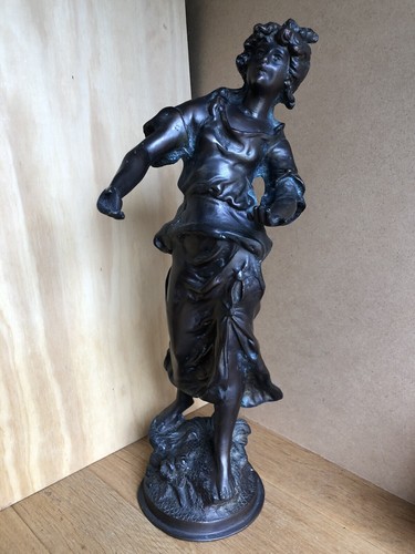 Bronze statue young - of,