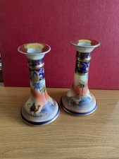 Pair of vintage Noritake porcelain candlesticks with desert scene