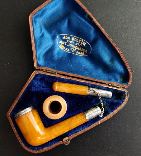 Antique smoking pipe made - , of