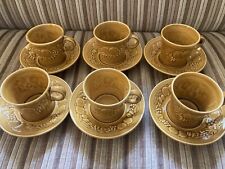 6 coffee cups and saucers by