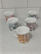 Vintage set of floral mugs 