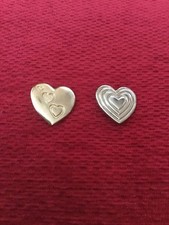 TWO VARIETY CLUB HEART BADGES.