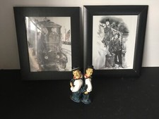 Laurel and Hardy figurines and 2 prints
