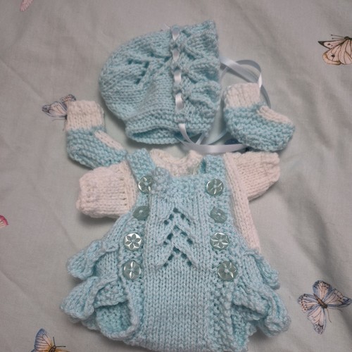 Hand knitted reborn - 12/13",