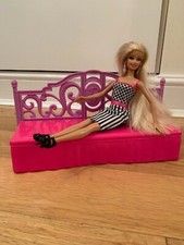 Barbie doll with chaise