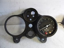 SUZUKI GT750 CLOCKS BRACKET AND TACHO [tacho for parts]