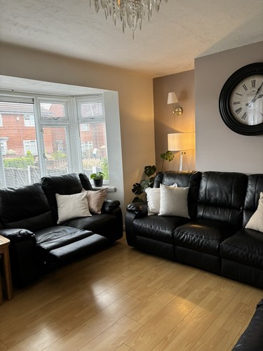 Black reclinable leather sofa - reclinable,