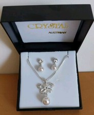 Elegant Silver Bow Pendant and