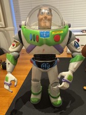 2001 Hasbro Woody with guitar and hat and Buzz Light Year