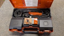 Feim 240v multi tool with sanding attachment in red case.