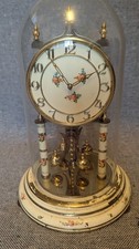 Mechanical clock with glass