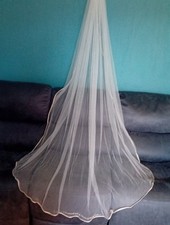 Ivory single tier chapel length veil with comb slide champagne satin edge v419