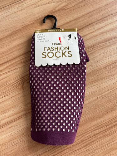 Primark aubergine fish net