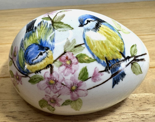 Hand painted porcelain egg - hand,