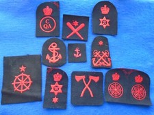 COLLECTION OF ROYAL NAVY EMBROIDERED TRADE & RANK BADGES