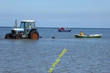 Photo 6x4 Collecting a boat