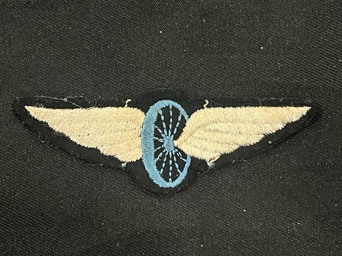 Vintage winged wheel biker - winged,