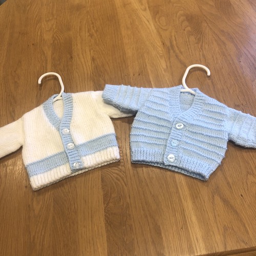 Hand knitted baby - hand,