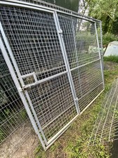 A pair of Kennel Run Panels - two wall panels - one with door