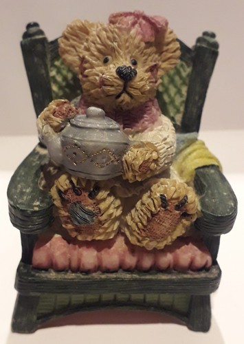 Bear sat chair holding - in,