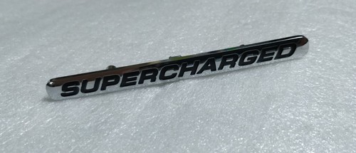 Emblem supercharged badge - supercharged,