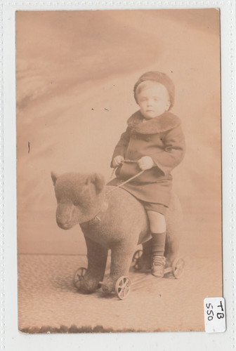 Young boy sitting teddy - young,