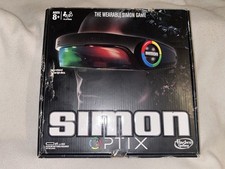 BOXED SIMON OPTIX THE WEARABLE SIMON GAME BY HASBRO