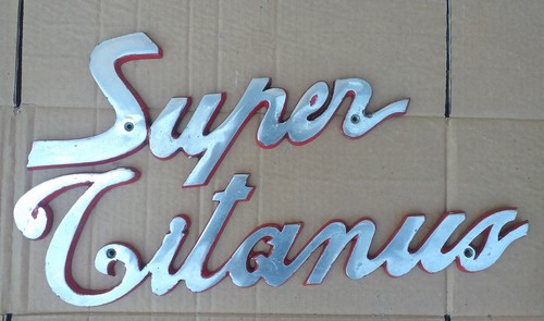 Vintage chrome sign written - -,