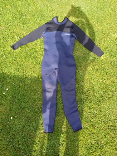 Two bare feet - two, wetsuit,