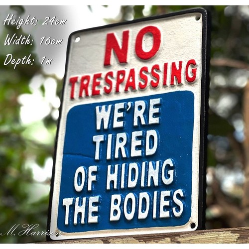 Cast iron sign - cast, trespassing