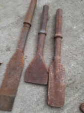 Jack hammer chisels  3 pff them rusty but little used 