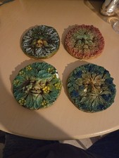 Set Of 4 Green Man Plaques. Unfortunately 1 Has A Chipped Flower on Front?