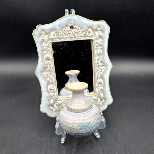 Art pottery bud - vase, mirror