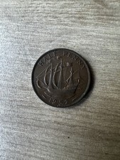 A Bronze British Half Penny From 1952