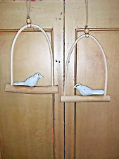 A SET OF TWO HAND CARVED